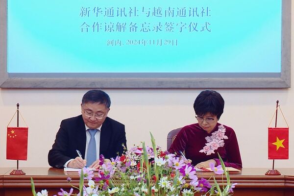 VNA, Xinhua enhance information cooperation