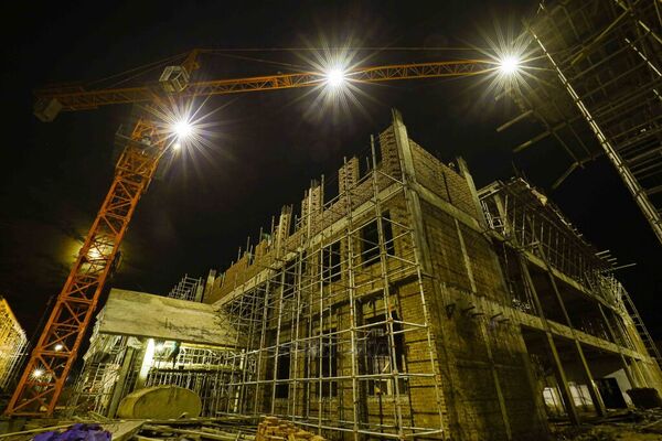 Working through night on construction site of Si Pa Phin Inter-level School in Dien Bien